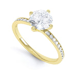 4 claw round diamond with shoulder stones  - SLE1022